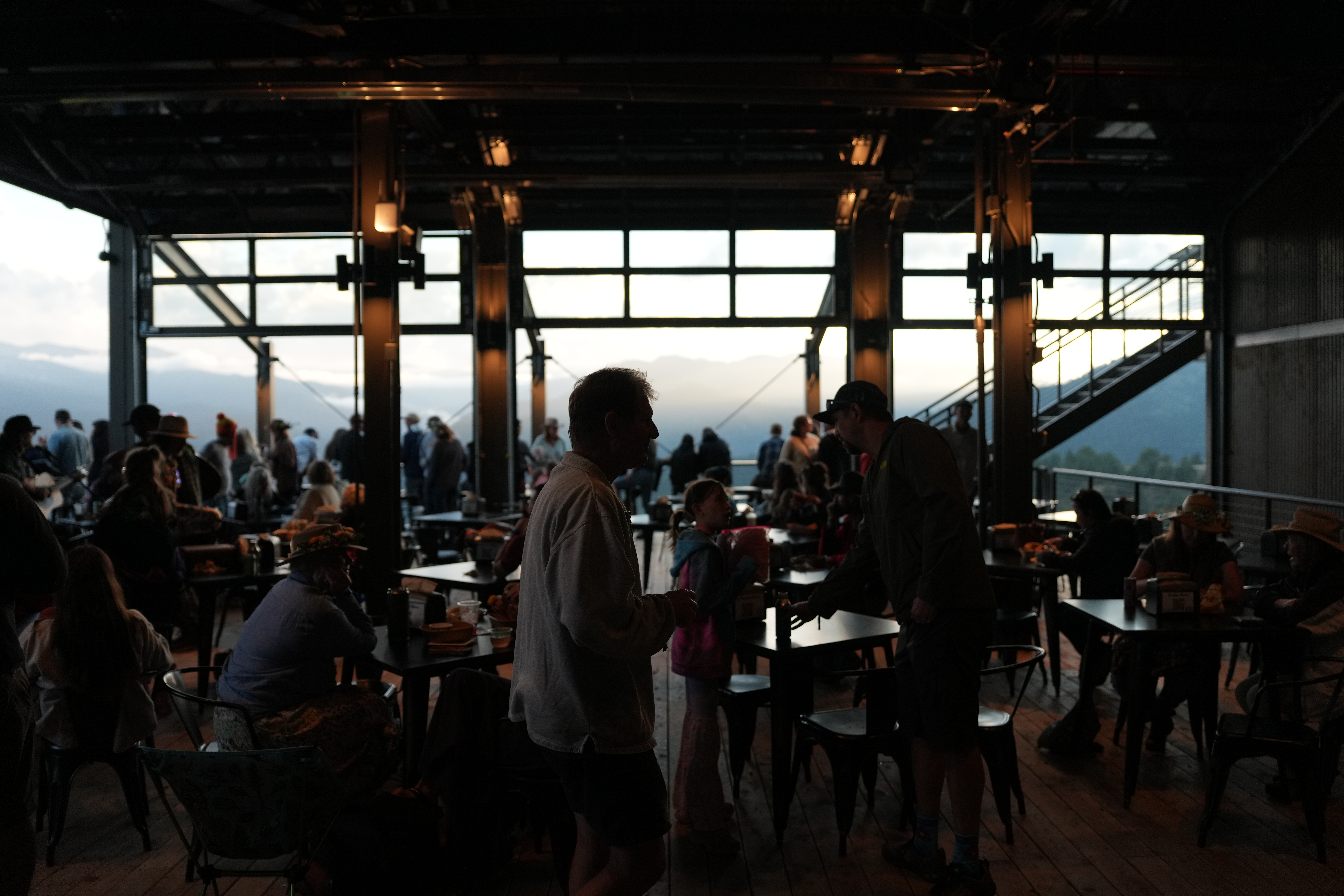 The Gold Bar at the Outpost — the main room, with the canyon beyond the glass